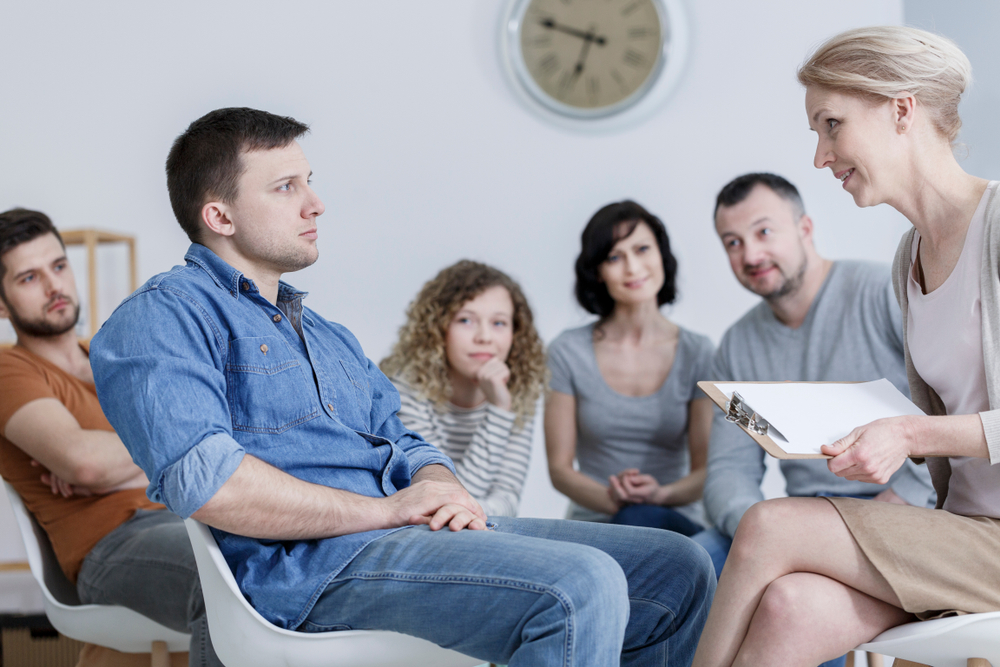 Serious,Patient,Looking,At,His,Therapist,During,An,Anger,Management Improv Acting