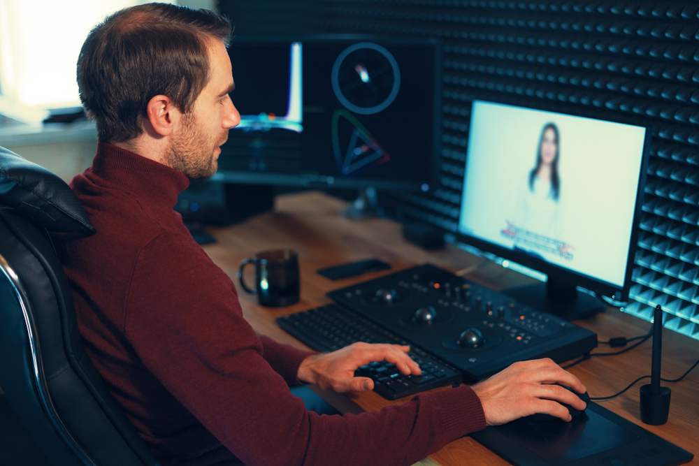 Confident,Man,Video,Editor,Works,With,Footage,In,Creative,Office Confident,Man,Video,Editor,Works,With,Footage,In,Creative,Office